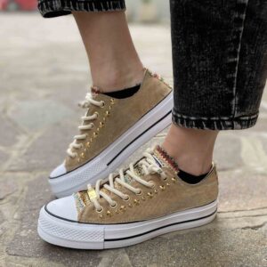 Converse low uomo oro online